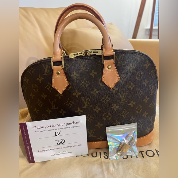 Louis Vuitton Alma PM Monogram Handbag. - Picture 12 of 15